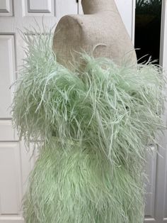 "Miki light green ostrich feather mini dress cocktail dress -Made to order -Please check my sizes chart before ordering -If it's doesn't fit with my size chart please measure your bust waist and hips -Dress made with ostrich feathers -Zipper closure on the back side -Straps can be taken off -Color: more than 18 colors -Dry clean only SGinstar Size Guide UK4/US0/EU32/AU4 Bust 31\"(78cm.) Waist24\"(60cm.) Hips33\"(83.5cm.) UK6/US2/EU34/AU6 Bust32\"(80.5cm.) Waist25\"(63cm.) Hips34\"(86cm.) UK8/US4 Fitted Feather Trim Mini Dress For Weddings, Strapless Dress With Feather Trim For Prom, Cocktail Dress With Ostrich Feathers, Fitted Prom Dress With Feather Trim, Elegant Wedding Dress With Ostrich Feathers, Feather Detailed Mini Dress For Prom Season, Fitted Feather Trim Dresses For Prom Season, Evening Feather Trim Mini Dress For Prom, Feathered Mini Dress For Prom Season