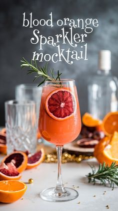 blood orange sparkler cocktail with rosemary garnish