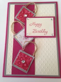 a birthday card with pink flowers on it