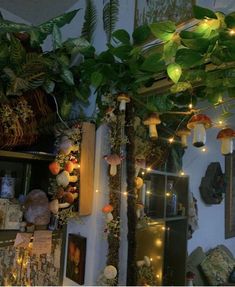 the room is decorated with plants and fairy lights