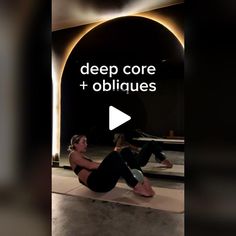 a woman sitting on top of a yoga mat with the words deep core + obliques