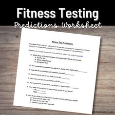 the fitness testing worksheet is on top of a wooden table with a cup of coffee