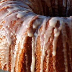 a bundt cake with icing on a plate