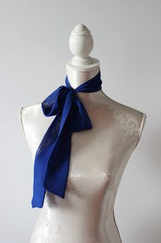 Chiffon skinny neck tie. This multifunctional day to night piece is a must have for every closet. You can wear it in many ways. Wear it loosely for layered look or knotted as a chic choker. Must have for every fashionista! Try it out as a hair wrap! Size Length 155cm | 61 in Width 5 cm | 2 in Available also in different colors. Handmade item. Wonderful gift for women or female friends. Feel free to contact me if you have any questions ;) Elegant Blue Scarf, Chic Blue Scarves For Gifts, Chic Blue Silk Scarf As Gift, Formal Scarf Neckwear, Classic Scarf Neckwear As Gift, Elegant Blue Shawl Scarves, Elegant Blue Shawl For Summer, Elegant Summer Blue Shawl, Elegant Blue Summer Shawl