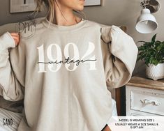 Step into your 30s in retro flair with our 1994 Birth Year sweatshirt! This 1994 crewneck is a must-have for commemorating your Thirtieth birthday in classic style. It also makes an ideal 30th birthday gift. ✨Please check the SIZE CHART image on the listing, and choose your size accordingly before placing your order.  🚫We do not accept exchanges, returns, or cancellations, however, if there are any quality issues with the item please contact us right away. We'll be happy to make things right an Hello 50, Hello 40, Fortieth Birthday, Happy Birthday Shirt, Year Sweatshirt, Old Sweatshirt, Birthday Basket, Forty Birthday, Fifty Birthday