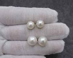 Material : Genuine Natural White Freshwater Pearls in 925 Sterling Gold Earring Post Quantity : One Pair Earring Color : Natural White Freshwater Pearls with high luster Pearl Shape : Round Button Shape Pearls Pearl Size : 8mm ; OR 10mm approx. *Due to the natural grown on the pearls, it will not be identical on each pearl* Lead Time & Shipping : We will ship your order in 1-3 business days to you once we received your order. If we offer FREE DOMESTIC shipping, package will be shipped via US Hypoallergenic Round Pearl Beads Earrings For Wedding, Classic Round Bead Wedding Earrings, Classic Beaded Wedding Earrings, Bridal Pearl Earrings, Bridesmaid Pearl Earrings, Pink Pearl Necklace, Bridal Pearl Necklace, Pearl Gifts, Bridesmaid Pearls