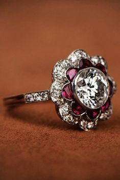 Rings With Diamonds All Around, Diamond Antique Rings, Ruby Ring Vintage Victorian, Amythest Rings Vintage, Art Deco Halo Ring, Engagement Rings With Rubies, Floral Diamond Ring, Floral Halo Engagement Ring, Vintage Floral Engagement Ring