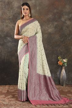 Shop stunning cream georgette sari online in USA with antique zari pink border. Be vision of elegance on special occasions in exquisite designer sarees, handwoven sarees, georgette sarees, embroidered sarees, Banarasi sarees from Pure Elegance Indian saree store in USA.-full view Festive Semi-stitched Cream Pre-draped Saree, Cream Saree For Eid Reception, Bollywood Style Cream Pre-draped Saree With Zari Work, Designer Cream Pre-draped Saree With Zari Work, Semi-stitched Cream Saree For Festive Occasions, Cream Pre-draped Saree With Cutdana For Diwali, Cream Cutdana Pre-draped Saree For Diwali, Festive Cream Semi-stitched Pre-draped Saree, Designer Cream Saree In Traditional Drape