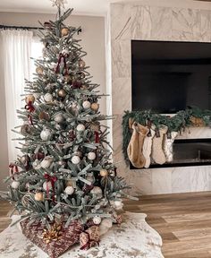 a decorated christmas tree in a living room