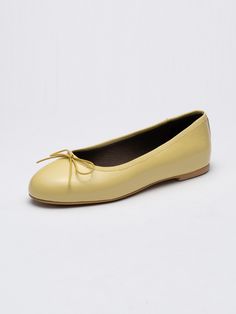 Editor's NotesSEONG YUN JOO presents feminine daily footwear that adds a sophisticated accent to your look. - Long round toes- Ribbon adorned on the upper- Naturally wrinkled fabric- Glossy and soft patent leather- Feminine and casual mood Measurements (in.)- Size: KR 220MM (US 5) ~ KR 265MM (US 9.5)- Heel: 0.31 in.*Fit true to size Composition & Care- Material: Cow Leather- Natural leather may have fine scratches and wrinkles- Bright leather can get stained by denim or d Ballet Flats With Removable Insole For Galas, Slip-on Ballet Flats For Galas, Elegant Fitted Ballet Flats With Rubber Sole, Elegant Yellow Slip-on Heels, Fitted Heels With Rubber Sole, Classic Flats For Galas, Yellow Flats With Removable Insole, Yellow Almond Toe Flats With Rubber Sole, Wrinkled Fabric