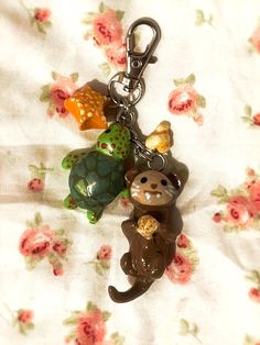 a keychain that has some animals on it