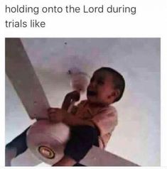 a kid holding onto the lord during trials like he is crying and pointing at something