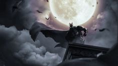 a man standing on top of a tower under a full moon with bats flying around