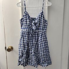 Never Worn. Bought But Didn't Like It On Me So Never Wore It. C Casual Plaid Dress For Beach, Casual Sleeveless Plaid Dress For Brunch, Plaid Cotton Sundress For Vacation, Gingham Cotton Mini Dress For The Beach, Gingham Cotton Mini Dress For Beach, Casual Plaid Cotton Sundress, Casual Cotton Plaid Dress For Vacation, Casual Mini-length Plaid Dress For The Beach, Gingham Cotton Mini Dress For Day Out