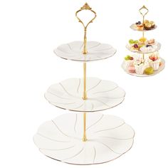 three tiered trays with different types of desserts on them, one is gold and the other is white