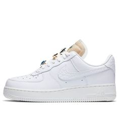 Nike Women Air Force 1 Low 07 LX Bling This AF1 features a white premium leather upper with jewels interwoven in the laces. Tumbled leather material is used on the swoosh and heels completed with a translucent coating on the padded tongues atop a solid white AF1 rubber sole. (AF1/SNKR/Skate/Low Top/Women's/Non-Slip) Nike Air Force 1 Leather With Laces, Nike Luxury Leather Sneakers, Nike Air Force 1 White Leather, Nike Air Force 1 White Leather Sneakers, White Leather Nike Air Force 1, Nike Leather Sneakers With White Laces, Women Air Force 1, White Af1, Nike Air Force 1 Low