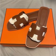 Brand New, Never Worn 100% Authentic Box Leather All Around Hermes Color: Gold ( Dark Camel Tan) Super Popular Classic Color And Hard To Find Perfect To Dress It Up Or Wear It Casually Made In Italy Hermes Fr Size 37.5 (Us 7.5) Designer Brown Calf Leather Sandals, Designer Brown Sandals With Leather Lining, Luxury Brown Sandals With Round Toe, Luxury Brown Slip-on Sandals, Luxury Brown Sandals With Leather Lining, Luxury Brown Sandals With Leather Footbed, Brown Closed Toe Calf Leather Sandals, Luxury Brown Sandals With Leather Sole, Designer Brown Open Toe Sandals