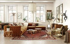 a living room filled with furniture and lots of windows