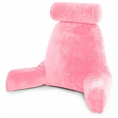 a pink stuffed animal sitting on top of a white floor