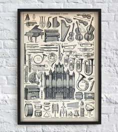 an old poster hanging on the wall with musical instruments and music instruments in it's black frame