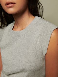 A muscle tank, but make it feminine, with a ribbed, crew neckline and over the shoulder short sleeves. (This one comes in Heather Grey.) | Women's Patti Tank Top in Heather Grey | Ethical Essentials Fitted Cotton Tank Top With Crew Neck, Fitted Crew Neck Tank Top For Everyday, Chic Cotton Crew Neck Muscle Tee, Fitted Tank Top With Ribbed Crew Neck, Fitted Crew Neck Tank Top With Ribbed Neckline, Fitted Cotton Muscle Tee For Layering, Chic Stretch Muscle Tee With Crew Neck, Fitted Muscle Tee For Spring, Fitted Muscle Tee For Everyday Spring Wear