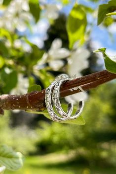 These Birch Hoop Earrings are the perfect combination of nature and style. Made from sustainable materials, their simple and classic design makes them ideal for every day wear. Add a touch of charm to any outfit with these perfect hoops! Handmade by Beth Millner Jewelry. Small Hammered Hoop Earrings, Everyday Small Hoop Hammered Earrings, Modern Handmade Huggie Earrings For Everyday, Handmade Hoop Earrings For Everyday Wear, Handmade Everyday Hoop Earrings, Handmade Nature-inspired Hoop Earrings, Everyday Adjustable Small Hoop Wrap Earrings, Handmade Small Hoop Earrings, Nature-inspired, Handmade Small Hoop Earrings Nature-inspired