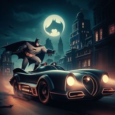 a batman car driving through the city at night