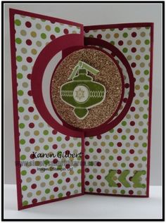 a handmade card with a green and red design