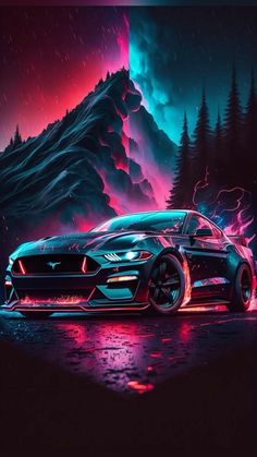 a car parked in front of a mountain at night with neon lights on the hood