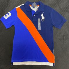 100% Cotton Fitted Blue Color Block T-shirt, Fitted Blue Color Block Shirt, Blue Color Block Short Sleeve Shirt, Casual Blue Color Block Shirt, Blue Short Sleeve Color Block Shirt, Sporty Orange Short Sleeve Shirt, Blue Color Block Polo Shirt, Young Mens Fashion, Latest Smartphones