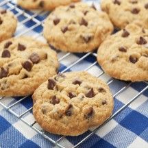 cookies cookbook cover with chocolate chip cookies on cooling rack and blue checkered tablecloth