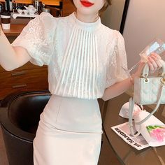 SPU:QZ5258YM color: white apricot Black style: Sweet sleeve length: short sleeve collar type: half turtleneck sleeve type: puff sleeve pattern: solid color details of clothing style: splicing size Chart Size Bust Length Sleeve Length Shoulder CM inch CM inch CM inch CM inch S? 90 35.43? 60 23.62? 26 10.24? 32 12.60? M 94 37.01? 61 24.02? 26.5 10.43? 33 12.99? L 98 38.58? 62 24.41? 27 10.63? 34 13.39? XL 102 40.16? 63 24.80? 27.5 10.83? 35 13.78? ? Puff Sleeve Pattern, Fairy Shirt, Black Lace Shirt, New Party Dress, White Chic, Fall Denim, Blouse Models, Black Long Sleeve Shirt, Lace Shirt