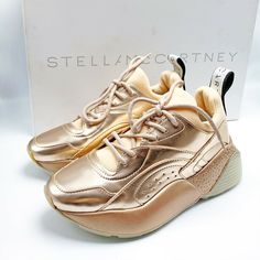 Up for sale is a pair of new in box and authentic STELLA MCCARTNEY Eclypse Lace Up Sneakers. MSRP $685. Size 35. Please note the shoes are past season stock so they may show minor shelf wear / marks. The box may also have wear and tear, however rest assured the shoes are new and unused. We kindly ask buyers to please only purchase if you are certain about the fit & size. We strongly suggest buyers to please try the shoes at retail stores before purchasing on eBay so that you are 100% sure about Luxury Platform Sneakers With Boost Midsole, Designer Platform Sneakers With Rubber Sole, Luxury Round Toe Platform Sneakers, Designer Low-top Platform Sneakers, Gold Platform Sneakers With Round Toe, Copper Rose Gold, Make A Decision, Copper Rose, Metallic Copper