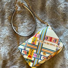 Brand New, Super Cute, And Perfect For Spring Small Bag. Multi Color Design On White. Tory Burch Small Bag, Tory Burch Bucket Bag, Tory Burch Ella Tote, Tory Burch Kira Chevron, Tory Burch Shoulder Bag, Ella Tote, Tory Burch Ella, Kira Chevron, Tory Burch Crossbody