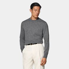 This grey crewneck sweater is tailored to a slim fit and features a soft and light texture and a ribbed hem and cuffs. Gray Cashmere Crew Neck Sweater, Classic Gray Sweater For Workwear, Gray Cashmere Sweater With Ribbed Collar, Classic Gray Sweater With Ribbed Cuffs, Classic Gray Cashmere Tops, Fitted Gray Sweater With Ribbed Cuffs, Classic Gray Sweatshirt With Ribbed Cuffs, Classic Gray Crew Neck Sweater, Gray Sweater With Ribbed Collar For Work