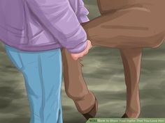 an image of two people holding hands with a horse