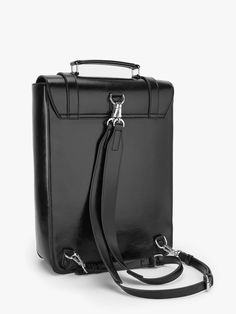 Looking for the Ecosusi dark series-15.6-inch Backpack, a versatile unisex bag that can be worn as a backpack or carried by hand for ultimate convenience and style. This backpack combines simplicity with a touch of breakthrough design. The standout feature of this bag is its high-quality metal clasp, paired with a sleek black mirrored waxed material that creates the perfect fusion of metallic aesthetics and modern sensibility. It has become a highly sought-after fashion accessory for both daily Modern Black Satchel For School, Black School Briefcase, Black Functional Backpack With Laptop Sleeve, Functional Black Backpack With Laptop Sleeve, Classic Black Satchel Backpack, Black Backpack Briefcase For School, Black Backpack With Luggage Sleeve For School, Classic Black Laptop Backpack, Black Backpack For School With Luggage Sleeve