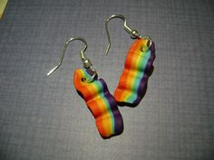 Rainbow Bacon Earrings Bacon measures approximately between 1.5cm to 2.25cm Materials: ▫ Polymer Clay ▫ Hypoallergenic Hanging Earring Hook Each bacon is handmade by me, so you may receive a pair of earrings that are slightly different from the ones pictured in the listing. As they are all made by hand all are similar but no two pairs will ever be the same! I can also do custom orders. Please feel free to send me a message with any questions or ideas! Thanks for checking out my shop! Rainbow Nickel-free Earrings For Gifts, Nickel-free Rainbow Earrings Gift, Nickel-free Rainbow Earrings For Gift, Rainbow Hypoallergenic Earrings As Gift, Adjustable Rainbow Earrings As Gift, Rainbow Single Earring As Gift, Single Rainbow Earring For Gift, Rainbow Polymer Clay Jewelry For Gifts, Rainbow Hoop Earrings With Ear Wire For Gift