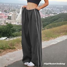 Thanks for clicking on this Y2K Nylon Sweatpants.😊💖 - 80% nylon, 20% polyester - Elastic band around the waist - Get your normal size for baggy fit and one size down for slightly baggy fit - Model in first pic wears is 1.68 m/5'6 tall, has a 92 cm hip circumference and wears size M - 60 DAYS RETURN POLICY ✅ If you have any questions, just contact us For more Y2K streetwear: www.etsy.com/de/shop/FlipPhoneClothing 90s Track Pants, Y2k Joggers, Y2k Sweatpants, Straight Leg Sweatpants, Black Y2k, Pants Straight Leg, Streetwear Y2k, Y2k Streetwear, Pants Straight