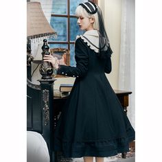 An embroidered dress, short jacket, and strap apron that will make you look like a butler's daughter with a mysterious atmosphere. The front of the dress is decorated with cross-shaped embroidery, and the jacket has bulges around the shoulders and is decorated with ruffles. An elegant item with a high waist and wide hem. 
 
 
 
 Scheduled delivery 
 
 This is a pre-order item. 
 It will take about 2 to 3 months from order to delivery. 
 
 
 Item 
 
 3-piece set of dress + short jacket (with jabo Fitted Doll Collar Dress For Cosplay, Spring Cosplay Dress With Doll Collar, Fall Lace Trim Dress With Doll Collar, Vintage Spring Dresses For Cosplay, Vintage Long Sleeve Dress For Fall Costume Party, Fall Long Sleeve Vintage Dress For Costume Party, Vintage Cosplay Dresses For Spring, Vintage Dresses For Spring Cosplay, Vintage Doll Collar Dresses For Winter