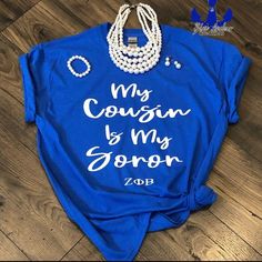 a t - shirt that says, my cousin is my son with pearls on it