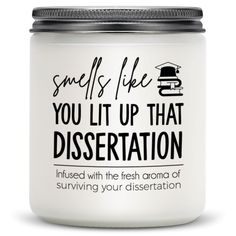 a white jar that says, smells like you lit up that dissentationion