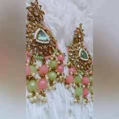 Light Green And Pink Jhumka (Earrings) Condition: Brand New Color: Light Green And Pink Mainly Style: Traditional South Asian Earrings Brand: Nimsim Accessories Message For Inquiries Pink Kundan Fusion Jewelry, Pink Dangle Danglers For Wedding, Pink Danglers For Wedding, Pink Kundan Chandelier Earrings For Celebration, Pink Chandbali Earrings For Wedding, Pink Chandbali Bridal Earrings Gift, Pink Chandbali Wedding Earrings, Fusion Style Pink Dangle Jewelry, Traditional Pink Chandelier Earrings For Gift