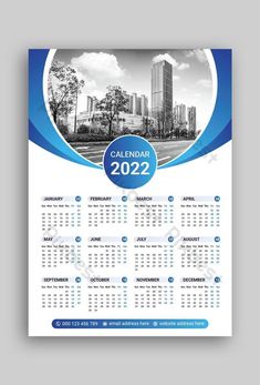 a blue and white calendar for the new year with cityscape in the background