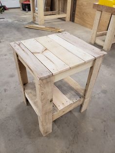 a table made out of wooden planks in a shop