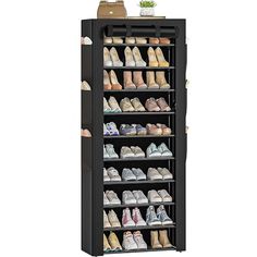 the shoe rack has many pairs of shoes on it and is black with brown trim