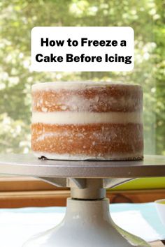 a cake sitting on top of a white plate with the words how to freeze a cake before icing