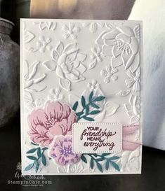 a close up of a card with flowers on it