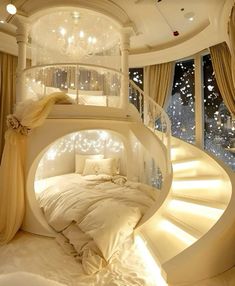 a bedroom with a spiral staircase leading up to the top floor and bed in it