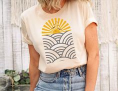 Boho sunset t-shirt, Minimalist t-shirt, Neutral Landscape, Adventure t-shirt, Abstract Mountain and Sun t-shirt SIZING -Please see size charts in the images above. Measure a favorite shirt from seam to seam and compare to get the fit you want. -Our t-shirts are a comfy unisex fit, for a FITTED look order ONE SIZE DOWN HOW TO CARE FOR YOUR T-SHIRT Machine Wash Warm, Inside Out, With Like Colors. Only Non-Chlorine Bleach. Tumble Dry Low. A very warm welcome to my SmashGlam Store! As a child, I ha Beach Tees For Women, Summer Tee Shirt Designs, Summer T Shirt Ideas, Trendy T Shirts For Women 2023, Beach Tee Shirts, Vintage Beach Shirt, Summer T Shirts Women, Cute Summer T Shirts, Summer T Shirt Outfits